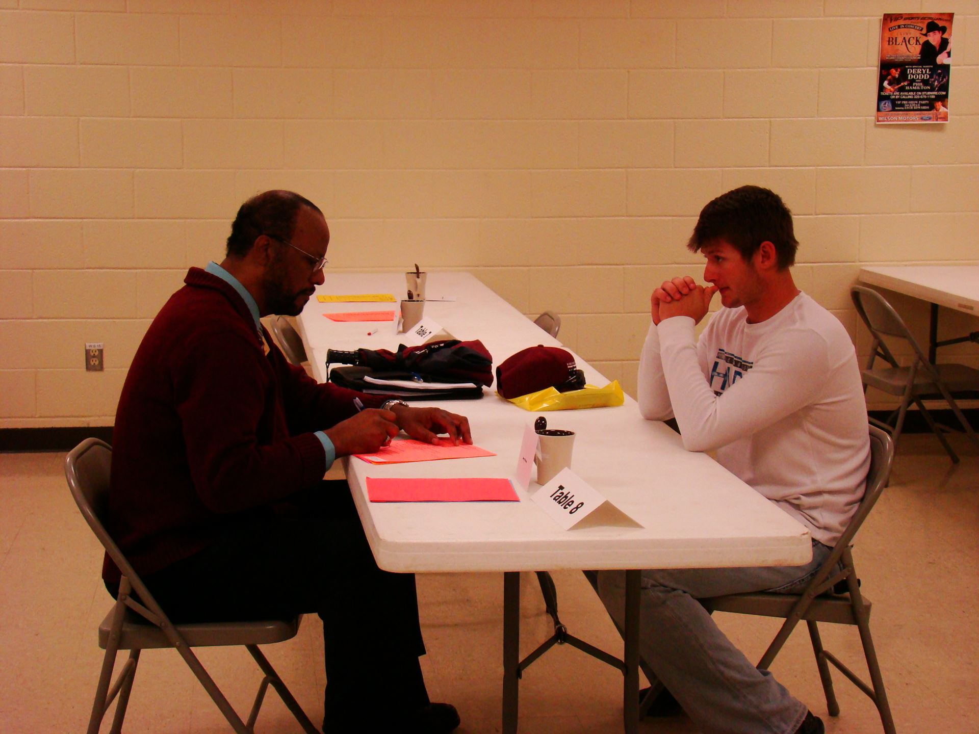 Employer conducts mock interview with student.