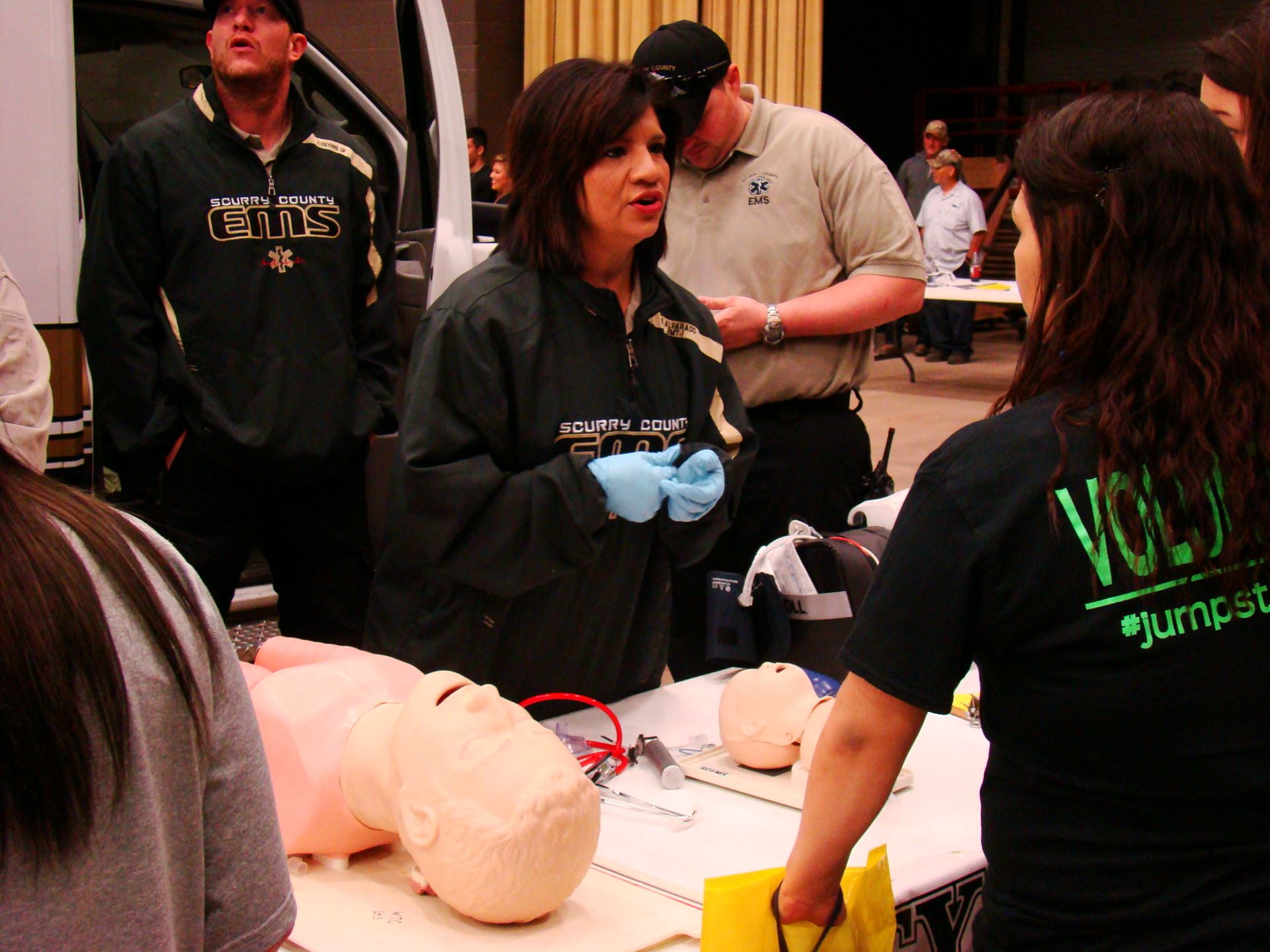 EMS personnel instruct students during demonstration.